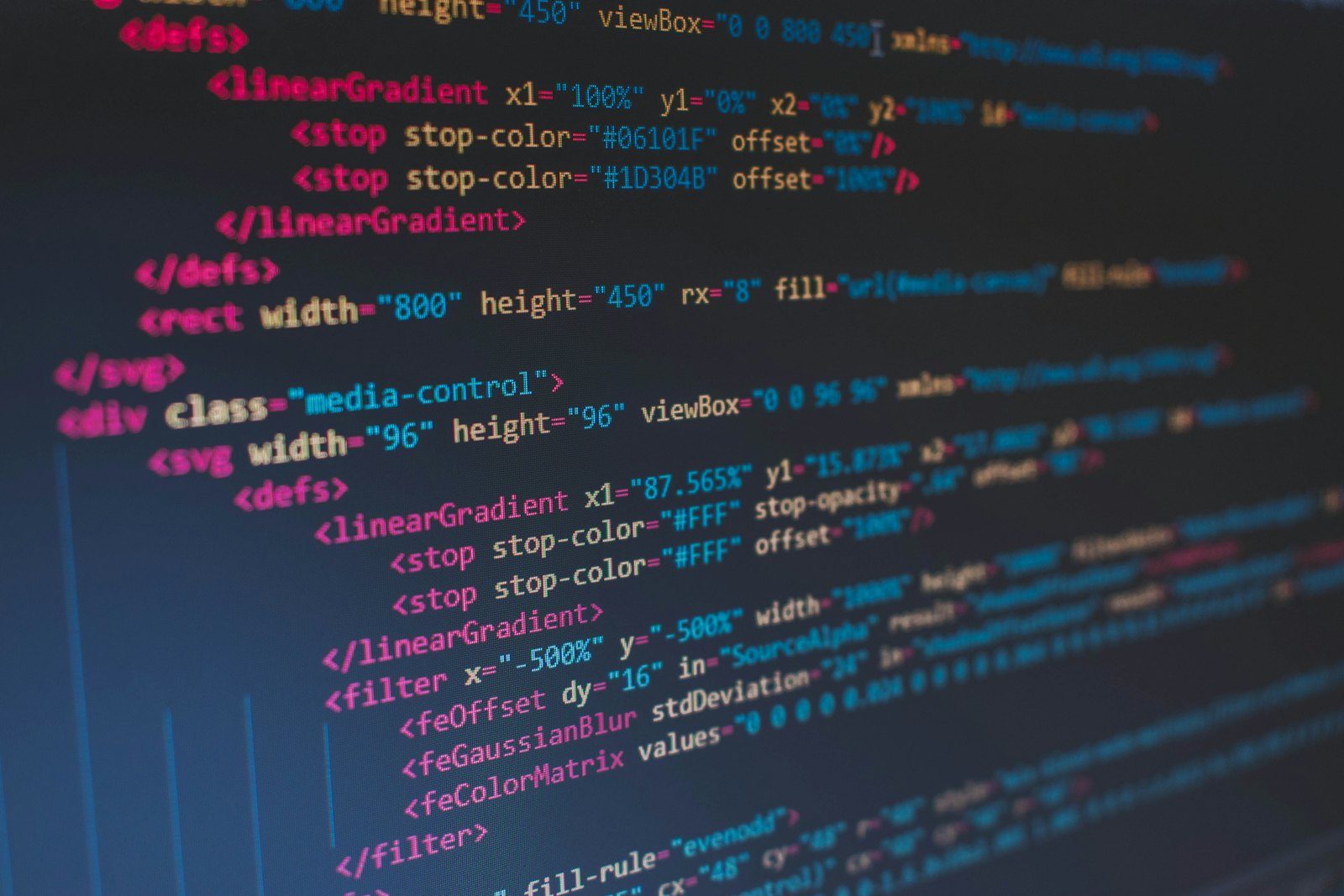 Developer editing open source application code on a computer screen